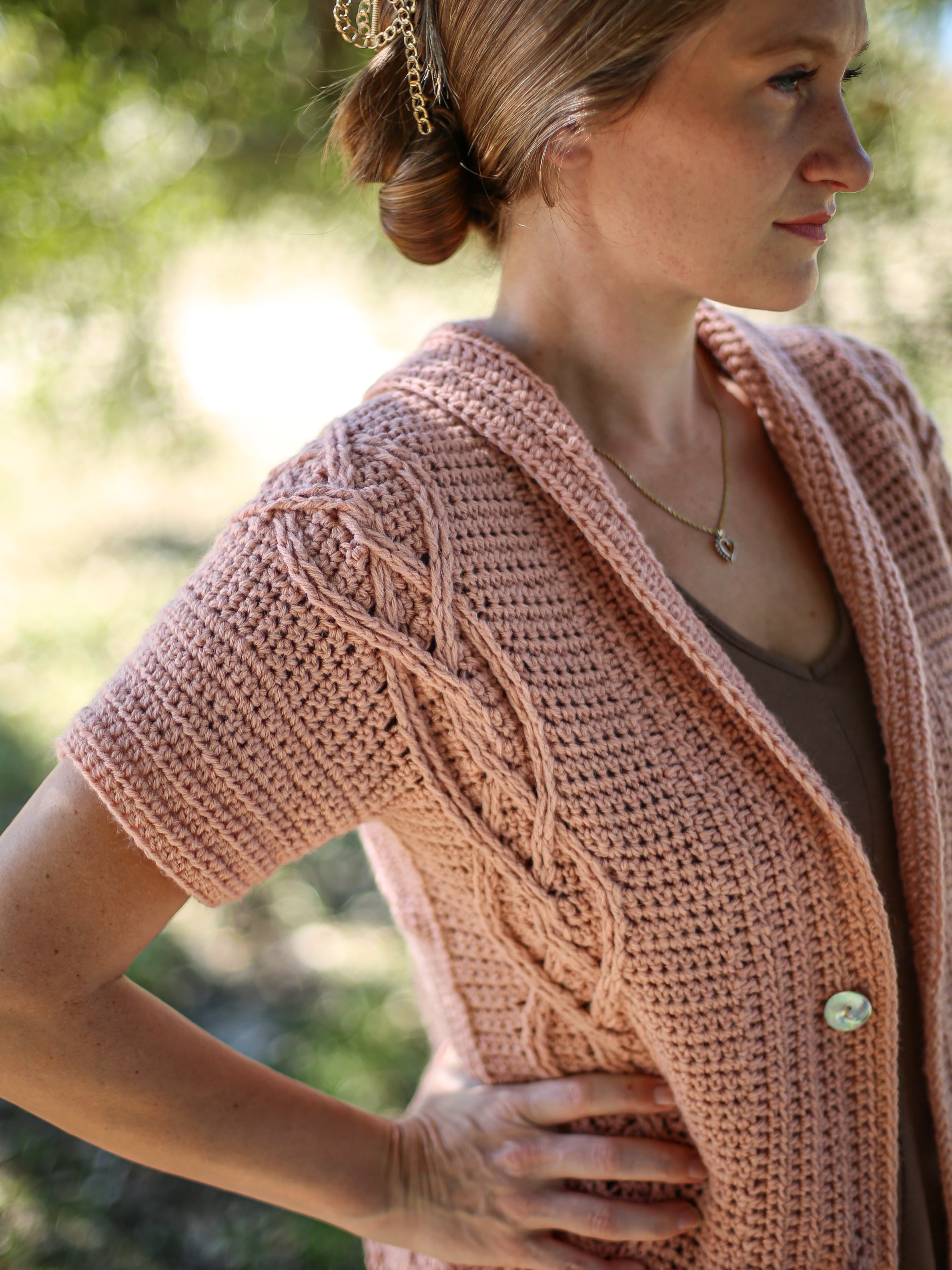 Find this free short-sleeve cabled crochet summer cardigan here